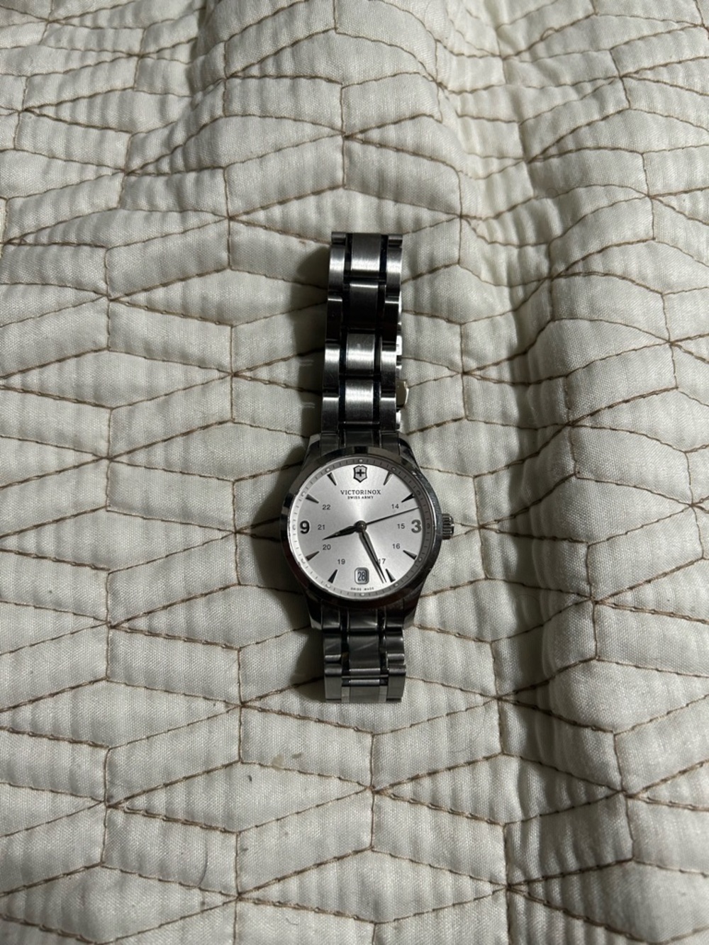 Victorinox womens Stainless Steel Silver Dial Watch needs a battery